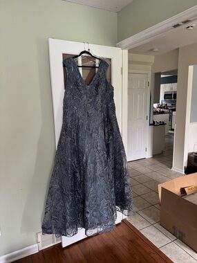 Own the room in this Ivonne D for Mon Cheri ball gown (style119D50)